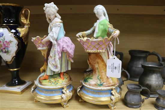 A pair of Paris porcelain figural bowls and a rolling pin